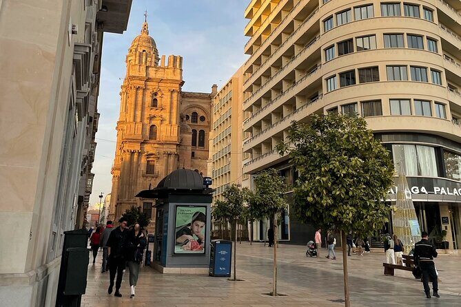 A Self-Guided Tour of Ancient Malaga’s History - Plaza del Obispo and the cathedral reveal: Manquita in motion
