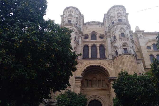 Guided visit to the Cathedral of Malaga and its surroundings - Plaza del Obispo: Episcopal Palace and the cathedral façade
