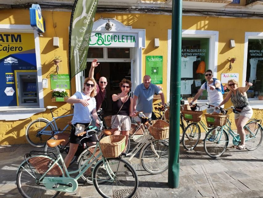 Malaga: Guided Bike Tour - Paseo del Parque: Palm shade and sculpture stops