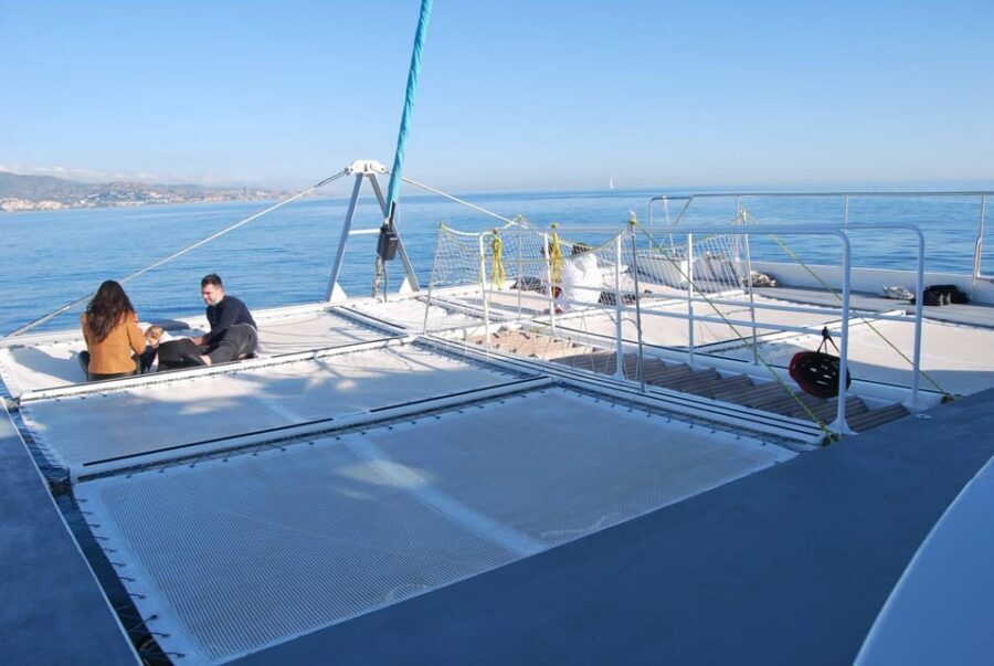Malaga: Sailing Catamaran Sunset Cruise with Live DJ & Drink - Should you book the Malaga sunset catamaran with DJ and cava?