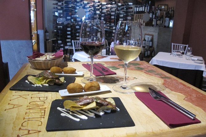 Malaga Wine & Tapas Small Group Guided Tour - The ultramarinos stop (Plaza Enrique Garcia Herrera 8) for ham and vermouth