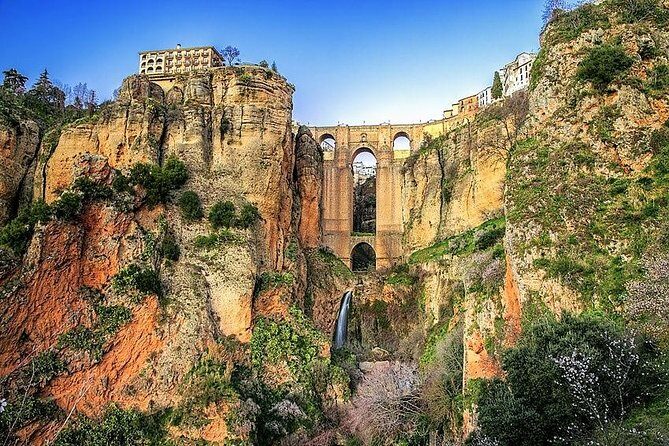Ronda private walking tour by Tours in Malaga - Collegiate Church and Town Hall: where the stories land